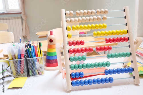 Wooden abacus with many colorful beads