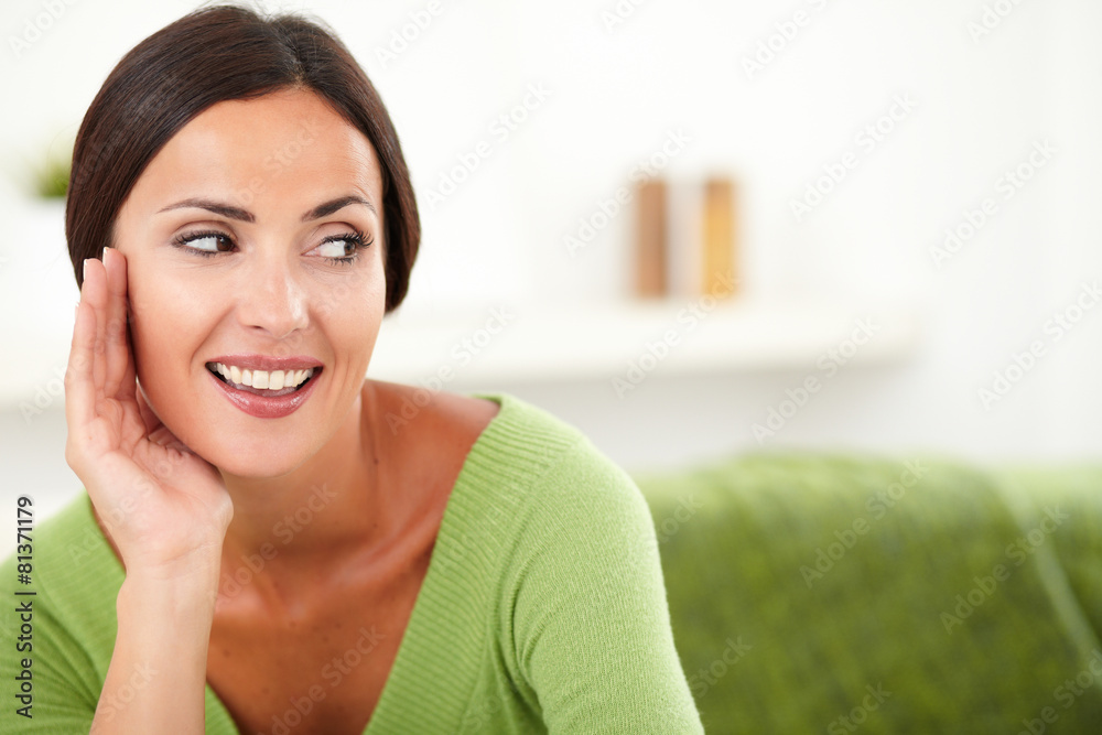 Beautiful woman smiling and looking away Beautiful woman smiling and looking away