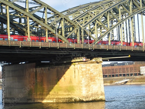 Zug auf der Hohenzollernbrücke in Köln photo