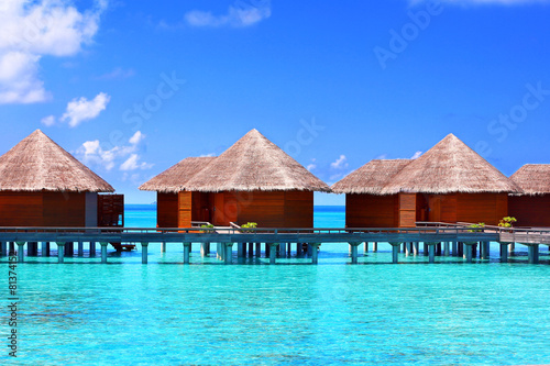 Fototapeta Naklejka Na Ścianę i Meble -  Water villas over blue ocean in Baros Maldives