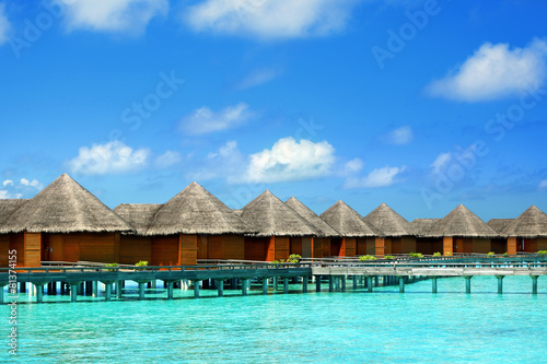 Fototapeta Naklejka Na Ścianę i Meble -  Water villas over blue ocean in baros Maldives