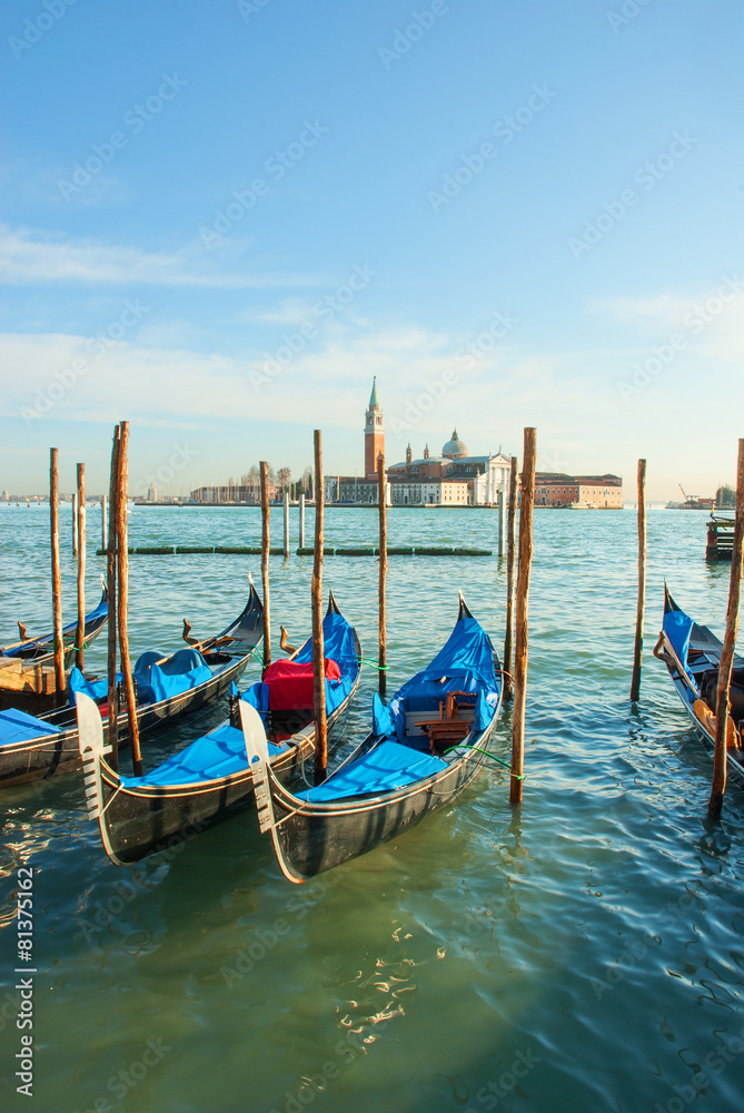 Venice, Italy, gondola parking at sunset.