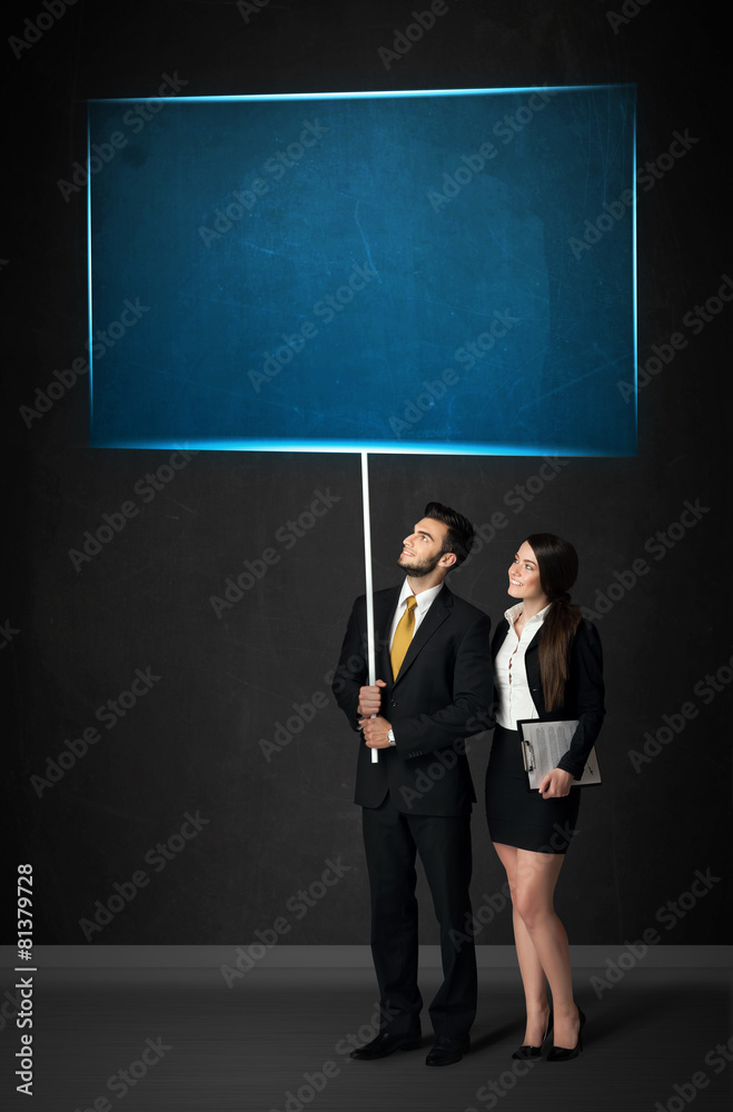 Business couple with blue board
