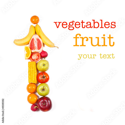 Vertical arrow from fruits and vegetables on a white background photo