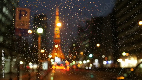 Nightscape of out of focus illumination in rain.