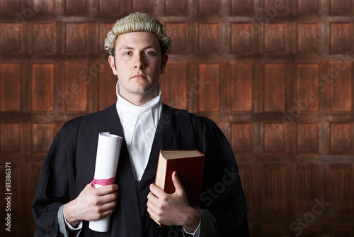 Portrait Of Lawyer In Court Holding Brief And Book photo