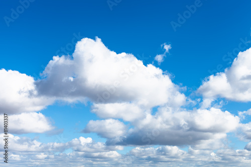 Photography white puffy clouds in blue spring sky