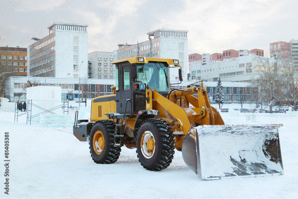 PERM, RUSSIA - DEC 17, 2013: Bulldozer after work in Ice town. PERM, RUSSIA - DEC 17, 2013: Bulldozer after work in Ice town.