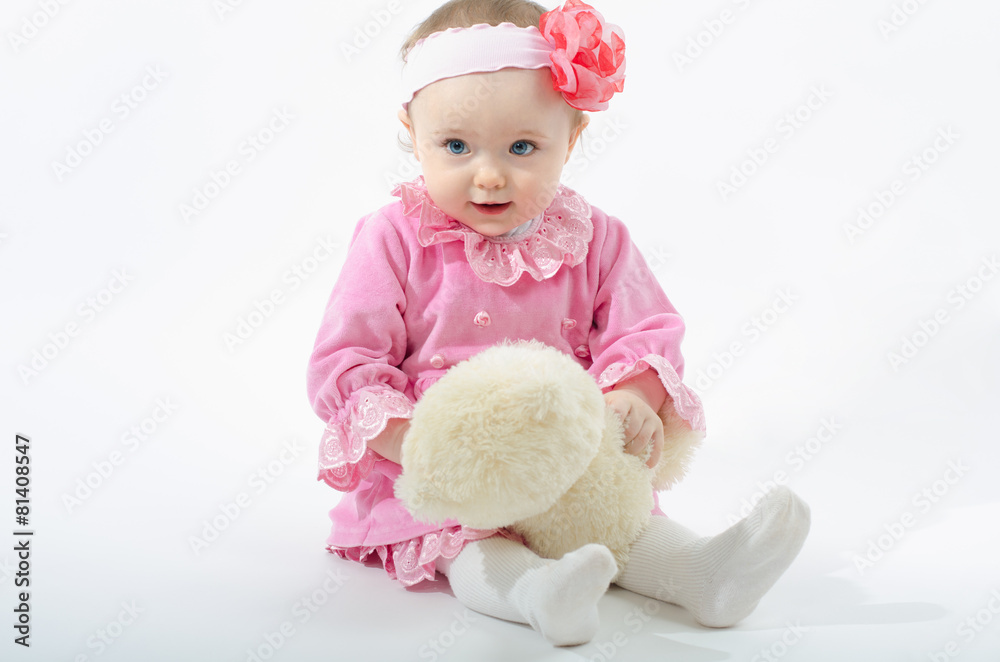 baby with a soft toy baby with a soft toy