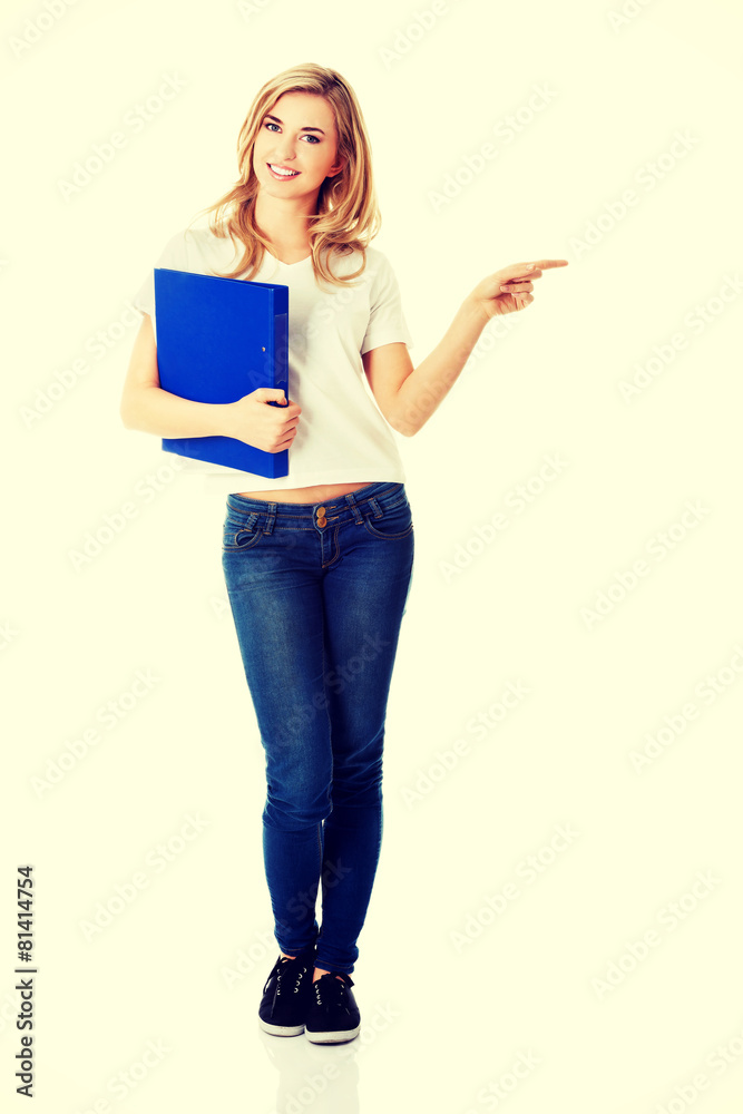 Student woman showing copyspace Student woman showing copyspace