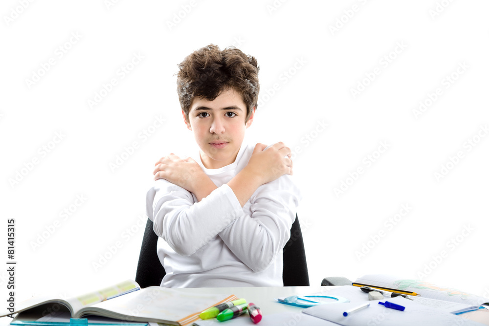 Caucasian smooth-skinned boy crosses arms hugging himself Caucasian smooth-skinned boy crosses arms hugging himself