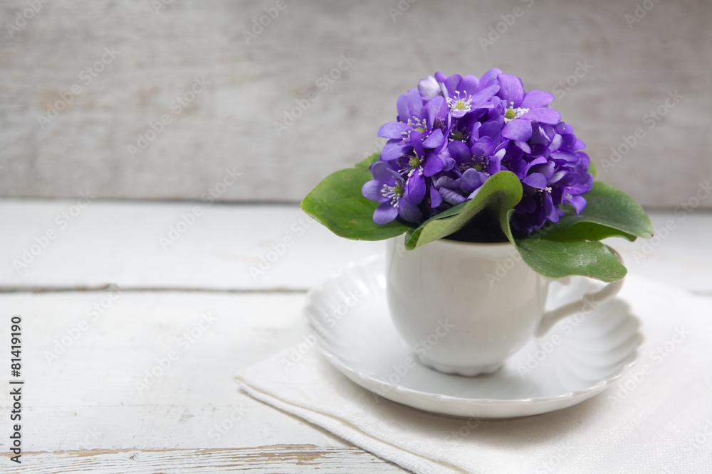 Violets flowers on wooden table Violets flowers on wooden table