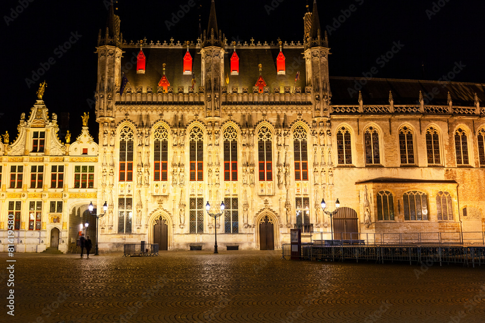 Stadhuis (City Hall) in Burg Square at night. Bruges, Belgium