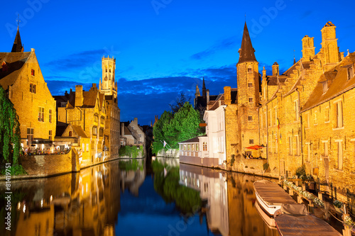 Dock of the Rosary and Belfry at twilight. Bruges, Belgium