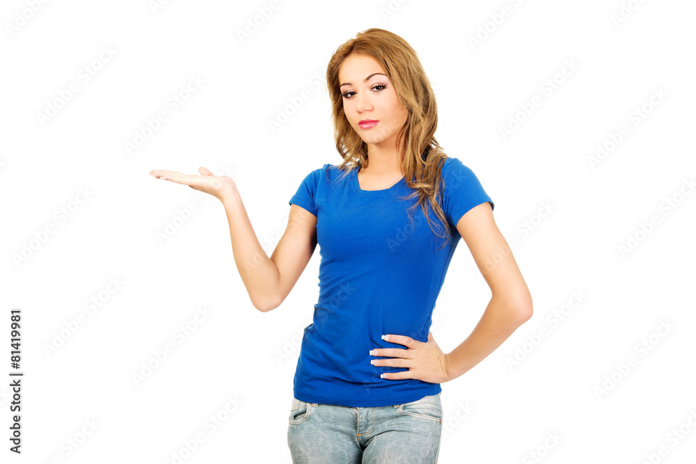 Young woman presenting a product. Young woman presenting a product.