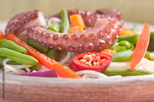Chinese mix vegetables with pasta and octopus.