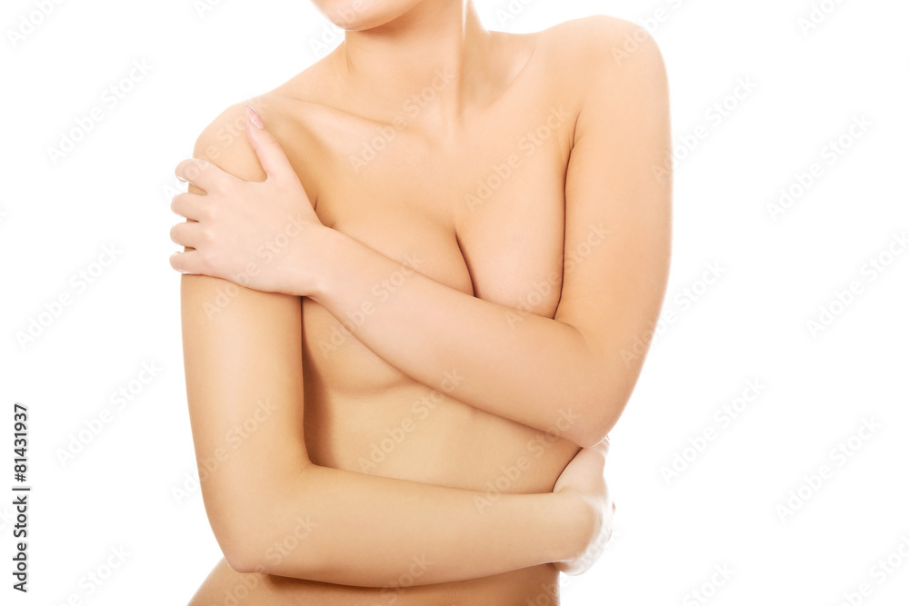 Fototapeta premium Woman covering her breast.