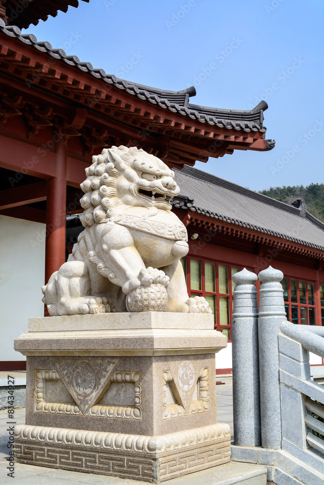 Stone lion statue in chinese temple