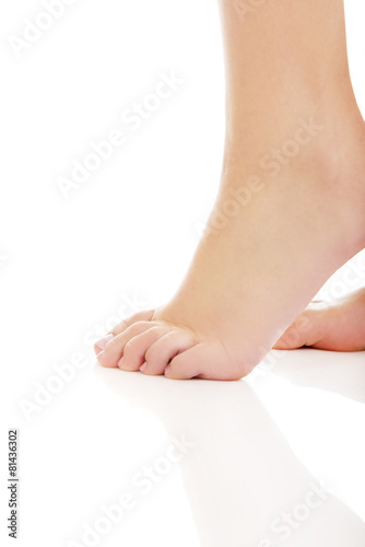 Woman's bare foot. © Piotr Marcinski