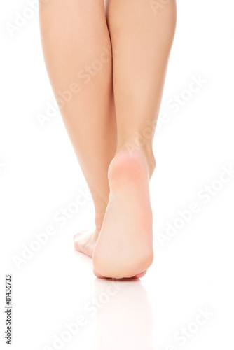 Woman's bare feet. © Piotr Marcinski