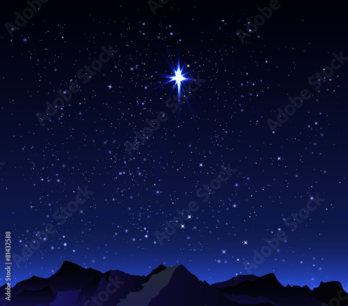 Mountains in the background starry night sky with a big star