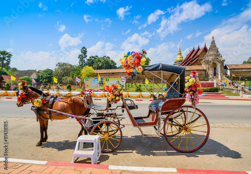 Horse carriage in temple Phrathat Lampang Luang in Lampang, Thai photo