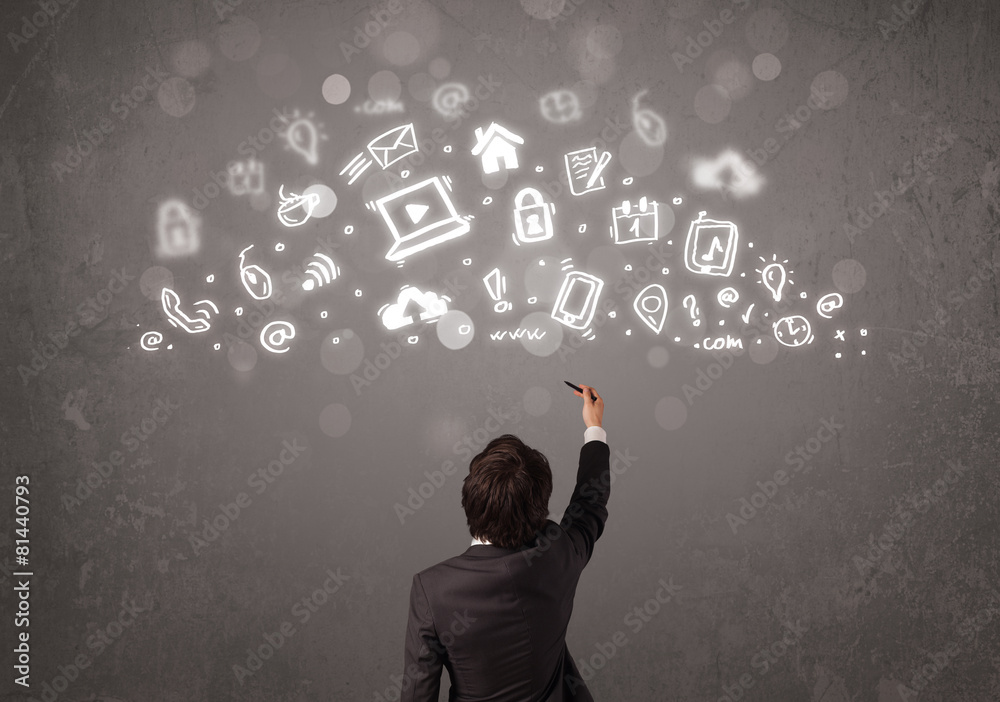 Business man looking at modern icons and symbols Business man looking at modern icons and symbols