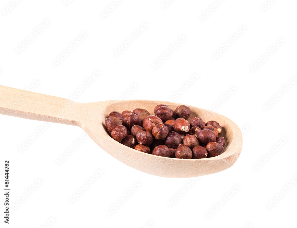Wooden spoon with nuts. Wooden spoon with nuts.