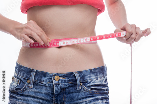 Woman measuring waist