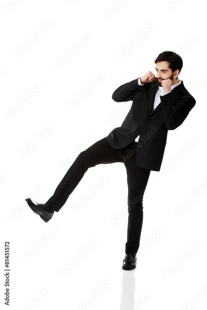 Angry businessman boxing. Angry businessman boxing.