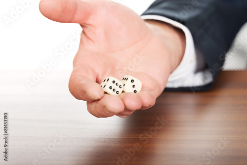 Male hand with two dices
