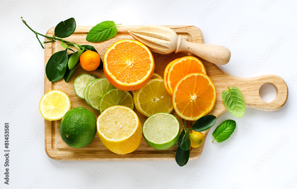 Fresh sliced citrus fruits copy space white background Fresh sliced citrus fruits copy space white background