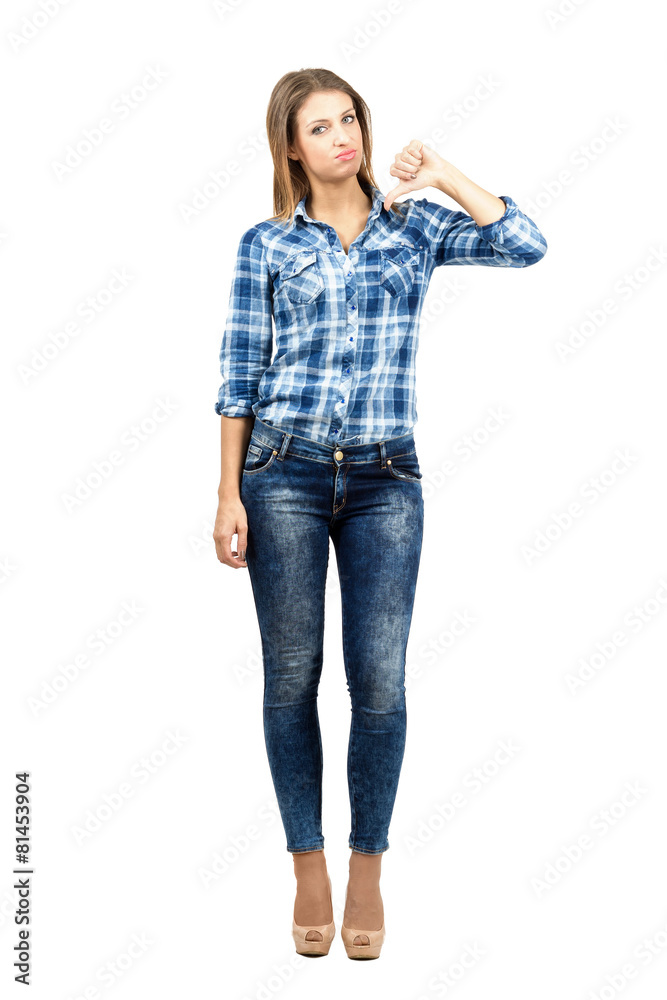 Disappointed woman with thumbs down Disappointed woman with thumbs down