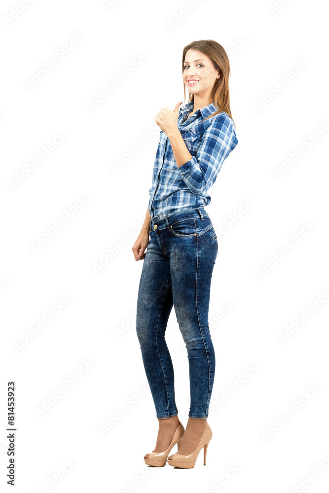 Beautiful female student with thumbs up Beautiful female student with thumbs up