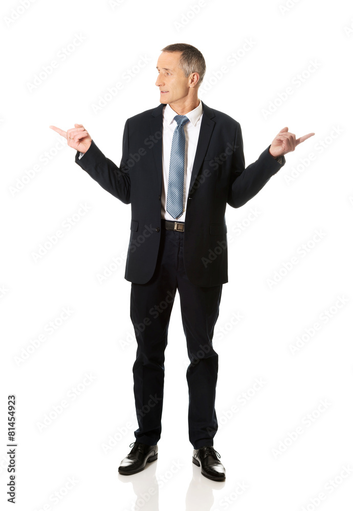 Businessman with hands on both sides Businessman with hands on both sides