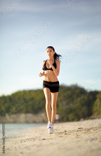 beauty woman run on sea beach