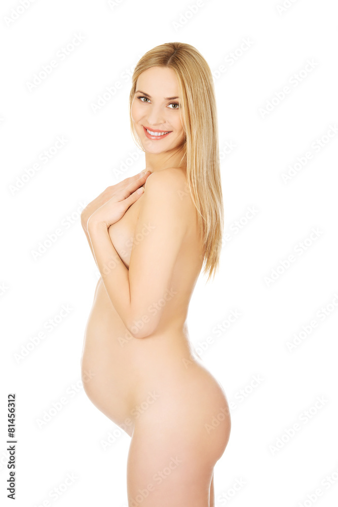 Fototapeta premium Pregnant woman covering her breast