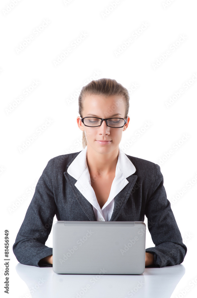 Office manager typing on the laptop isolated on white Office manager typing on the laptop isolated on white