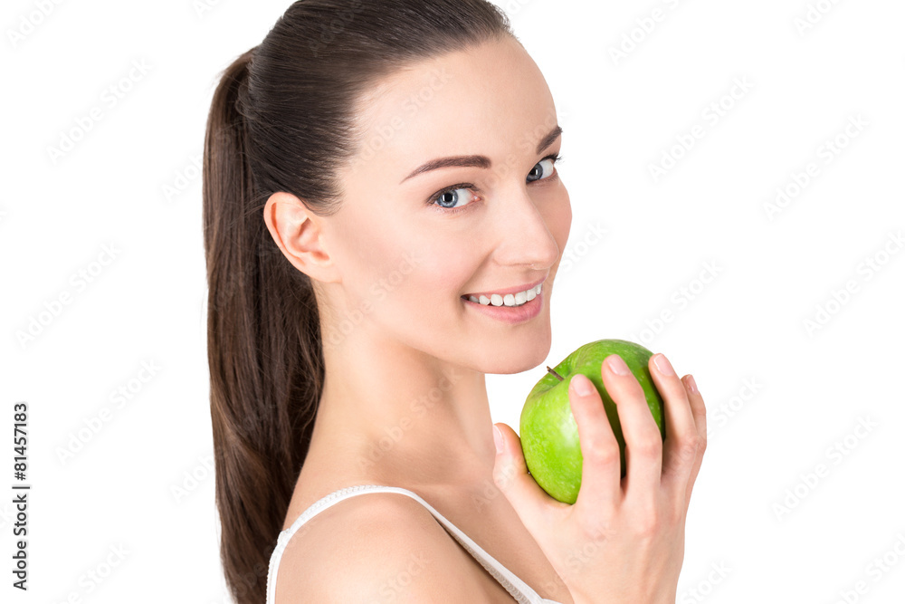 Portrait of young attractive woman with green apple. Dieting Portrait of young attractive woman with green apple. Dieting
