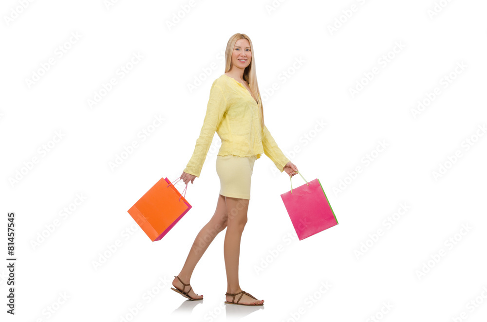 Pretty young woman in summer yellow clothing isolated on white Pretty young woman in summer yellow clothing isolated on white