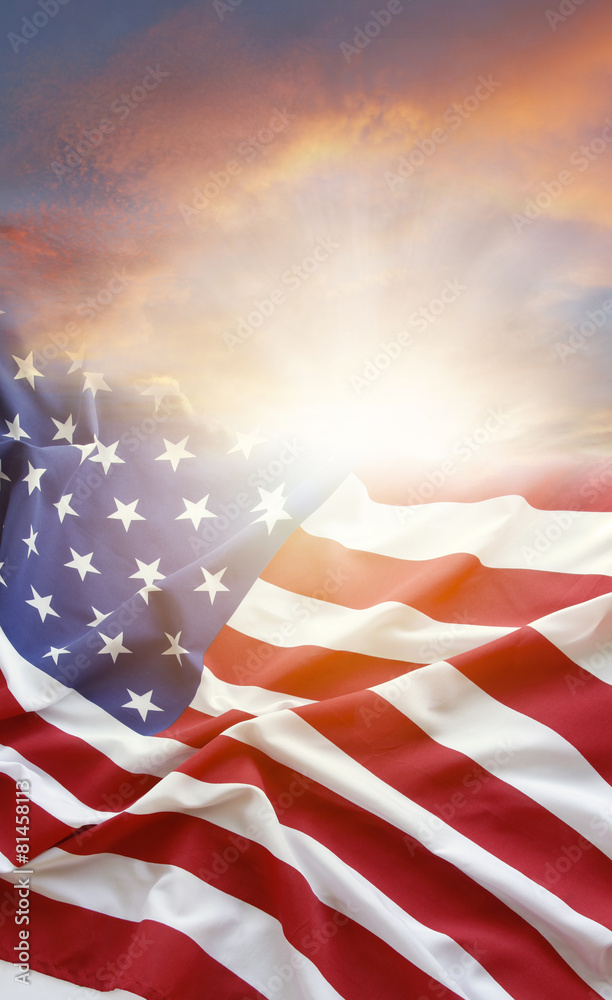 Obraz premium USA America flag in bright sunny sky