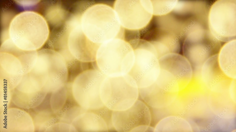 An abstract display of golden light circles