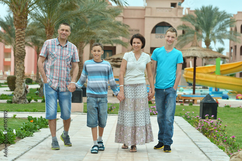 Family at tropical resort.