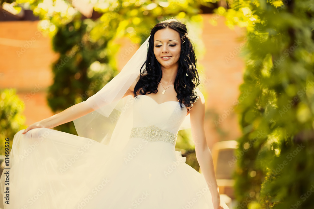 Adorable young caucasian bride in garden Adorable young caucasian bride in garden