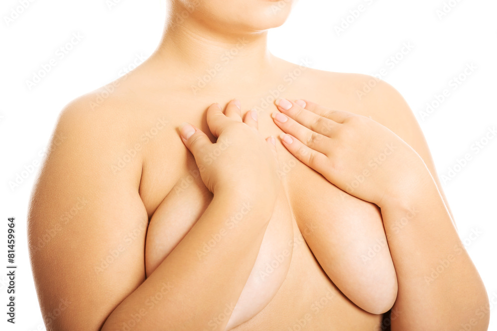 Fototapeta premium Overweight woman covering her breast
