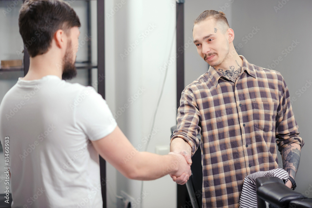 Fototapeta premium Barber meets a male client