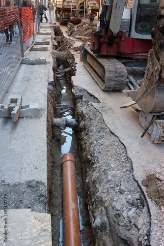 Cantiere lavori in corso, rifacimento stradale, tubazioni photo