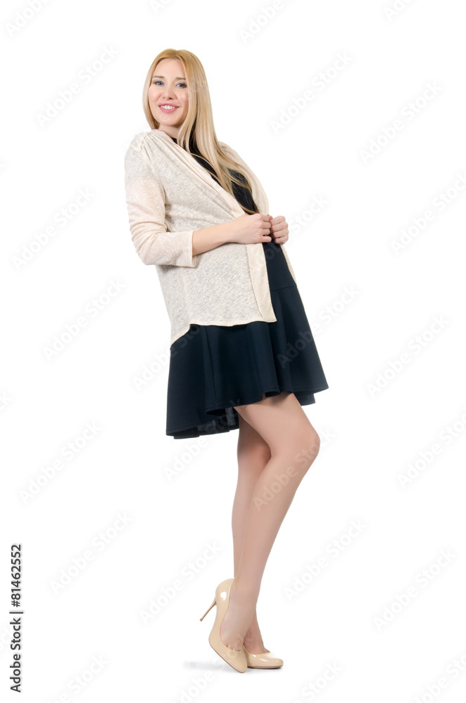Pretty pregnant woman in mini black dress isolated on white Pretty pregnant woman in mini black dress isolated on white