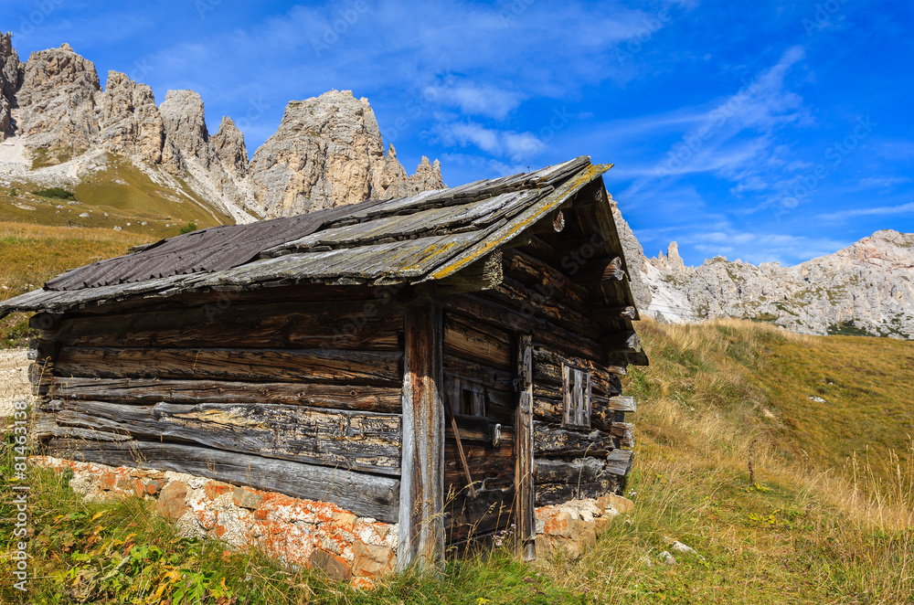 Wooden barn in Dolomites Mountains, Italy