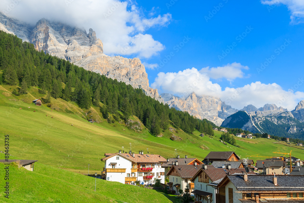 Green meadow in San Cassiano village, Dolomites Mountains, Italy